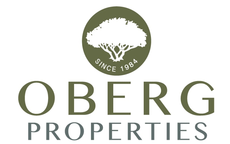 Oberg Properties logo with tree icon and since 1984 text